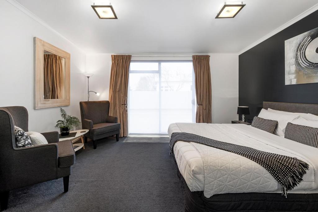 Voodi või voodid majutusasutuse Two Tree Lodge toas