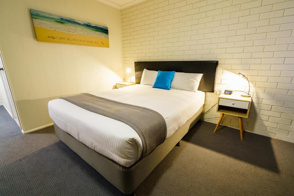 Postel nebo postele na pokoji v ubytování Comfort Inn on Main Hervey Bay