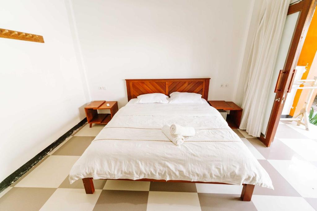 Uma cama ou camas num quarto em Dream CoWork Hotel