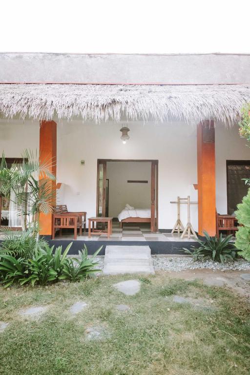 Um jardim no exterior de Dream CoWork Hotel