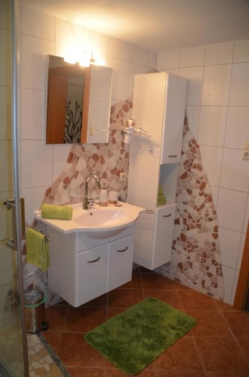 Koupelna v ubytování Reiters-Ferienhaus