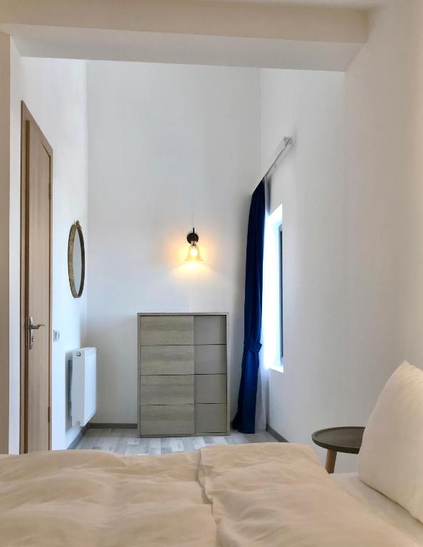 Postel nebo postele na pokoji v ubytování GVC 2-level apt New Gudauri Block-4
