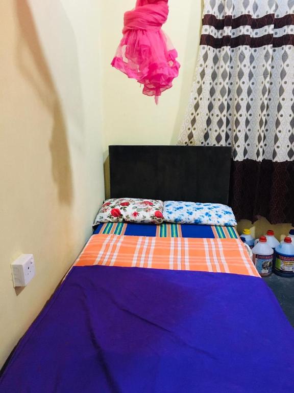 Postel nebo postele na pokoji v ubytování Bathiya Tourist Guest Anuradhapura