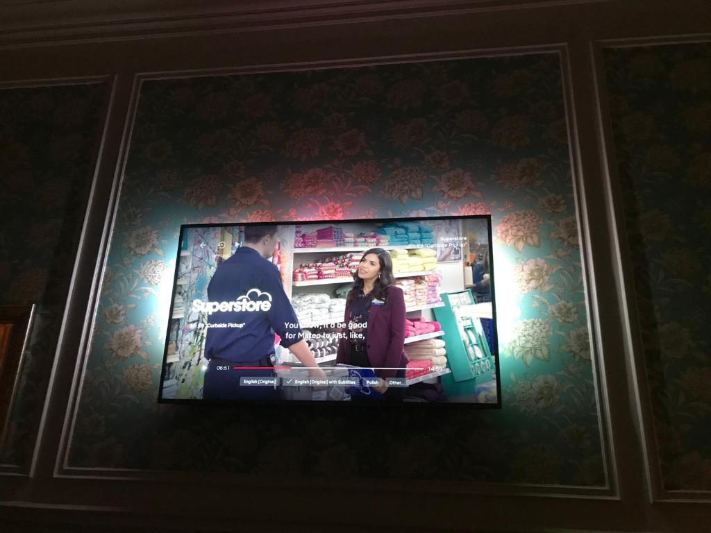 Televízia a/alebo spoločenská miestnosť v ubytovaní Blueberry Apartments