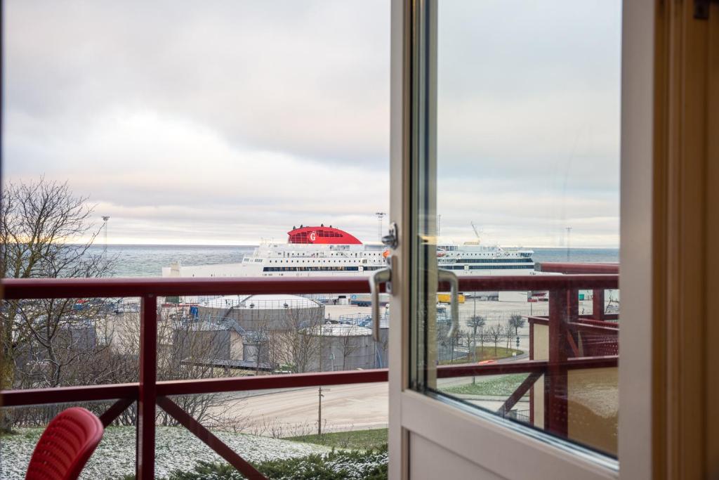 Balkón nebo terasa v ubytování Ravinstigen - Visby Lägenhetshotell