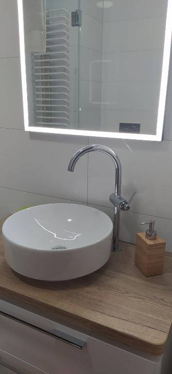Kúpeľňa v ubytovaní Apartament z widokiem