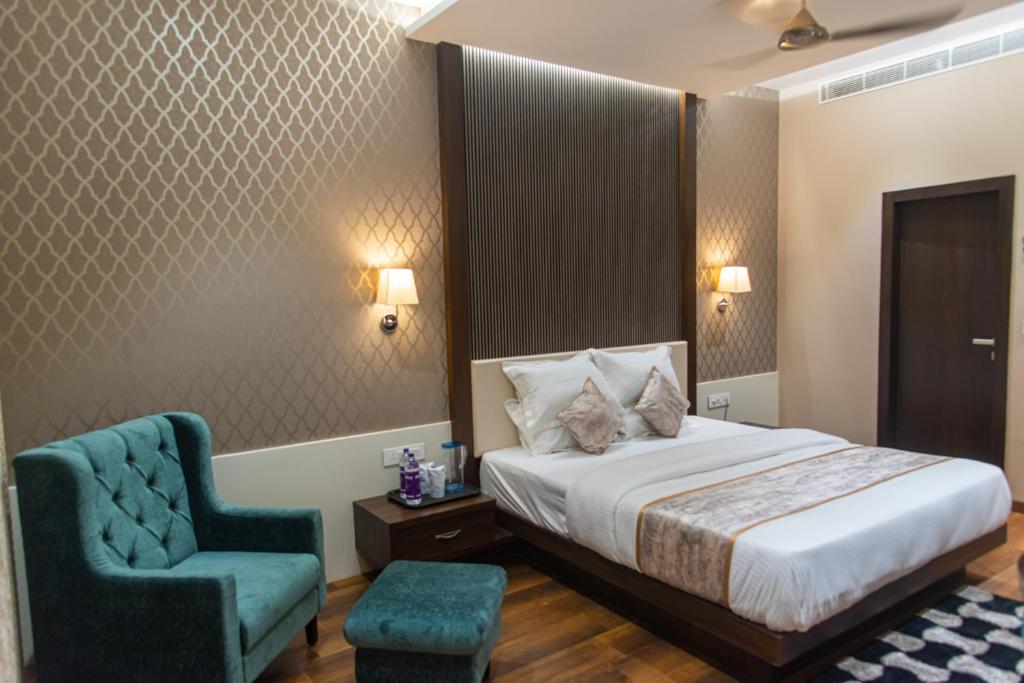 Postel nebo postele na pokoji v ubytování Hotel Royal Livin