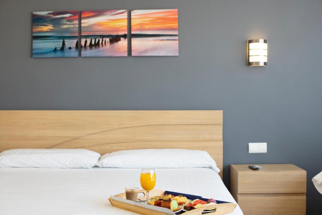
Cama o camas de una habitación en Hotel Maya Alicante
