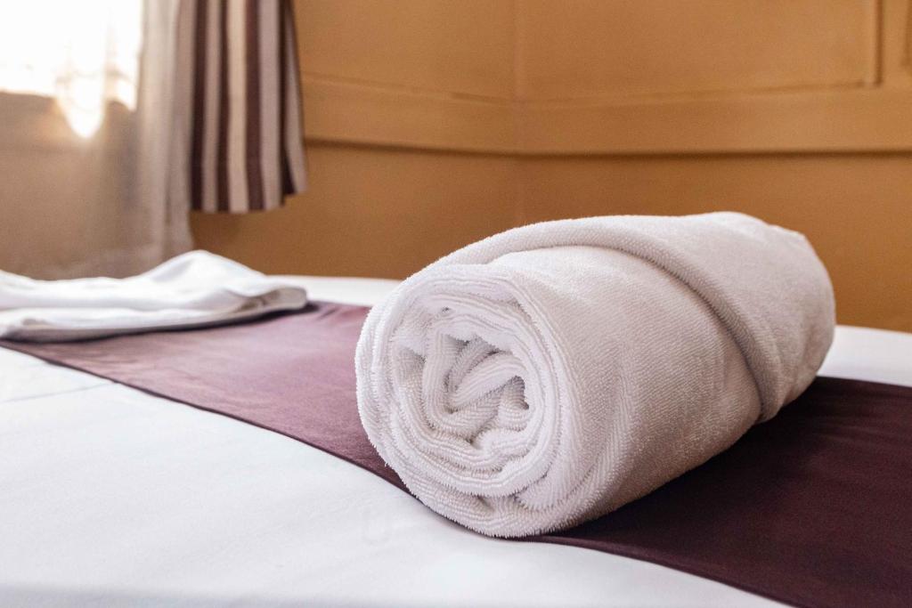 Postel nebo postele na pokoji v ubytování Impala Hotel Parklands