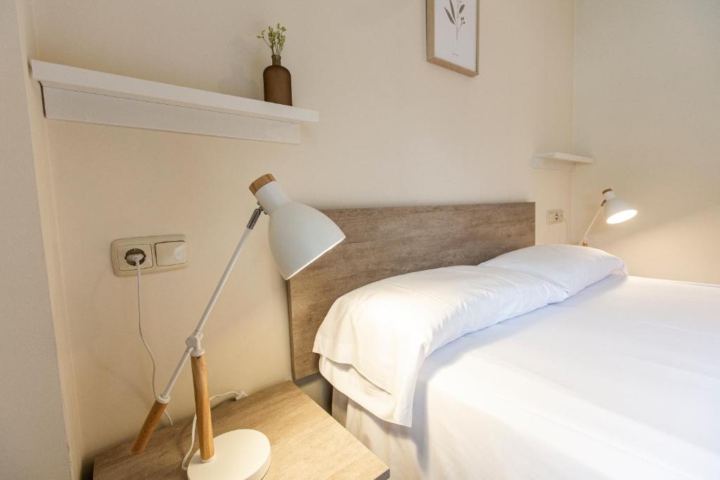 Postel nebo postele na pokoji v ubytování Outdoor Apartaments - Comfort