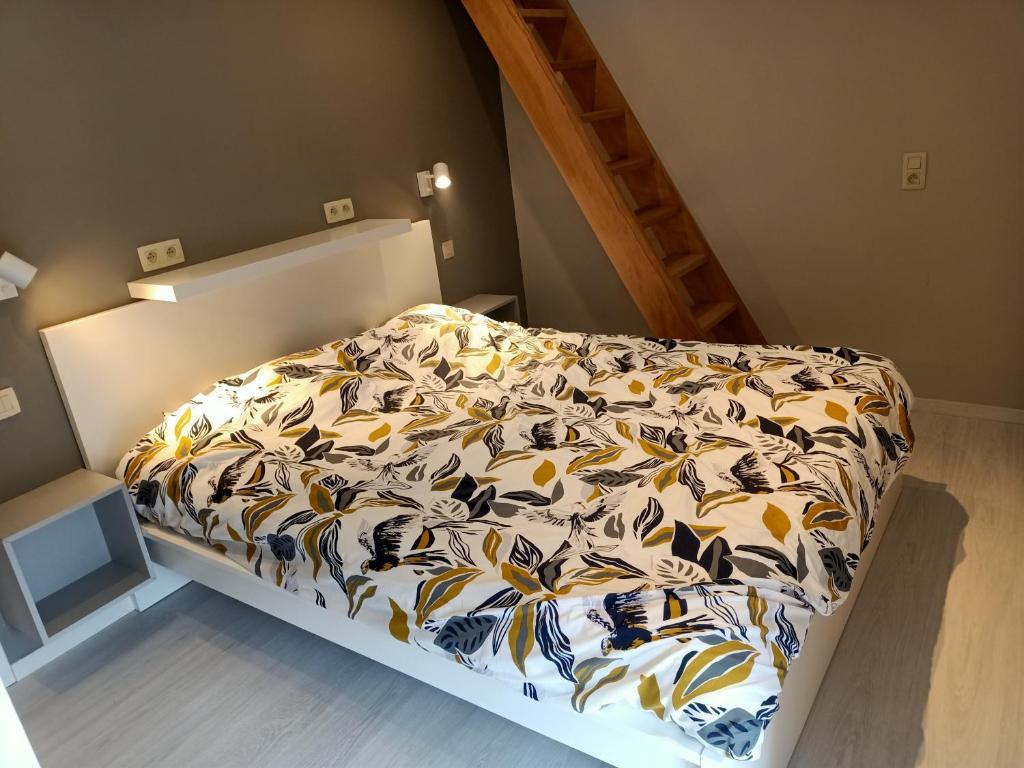 Postel nebo postele na pokoji v ubytování Les Gites d'Olloy - Le Beauséjour