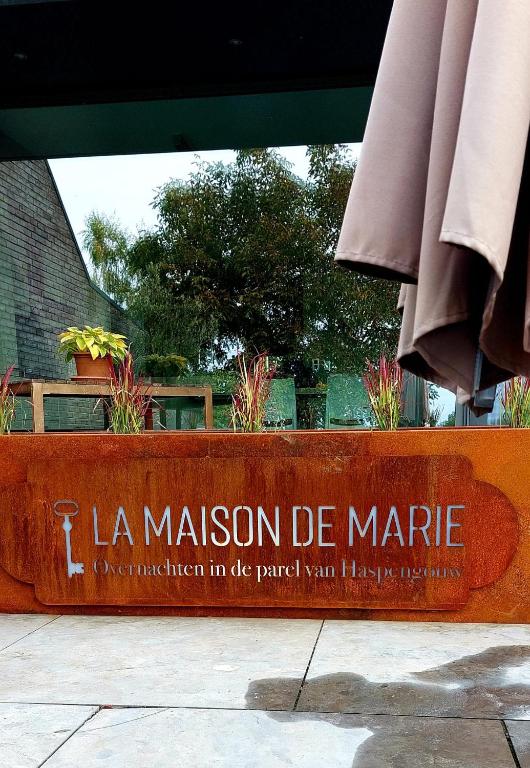 a sign that says la maison de marne at La Maison de Marie in Borgloon