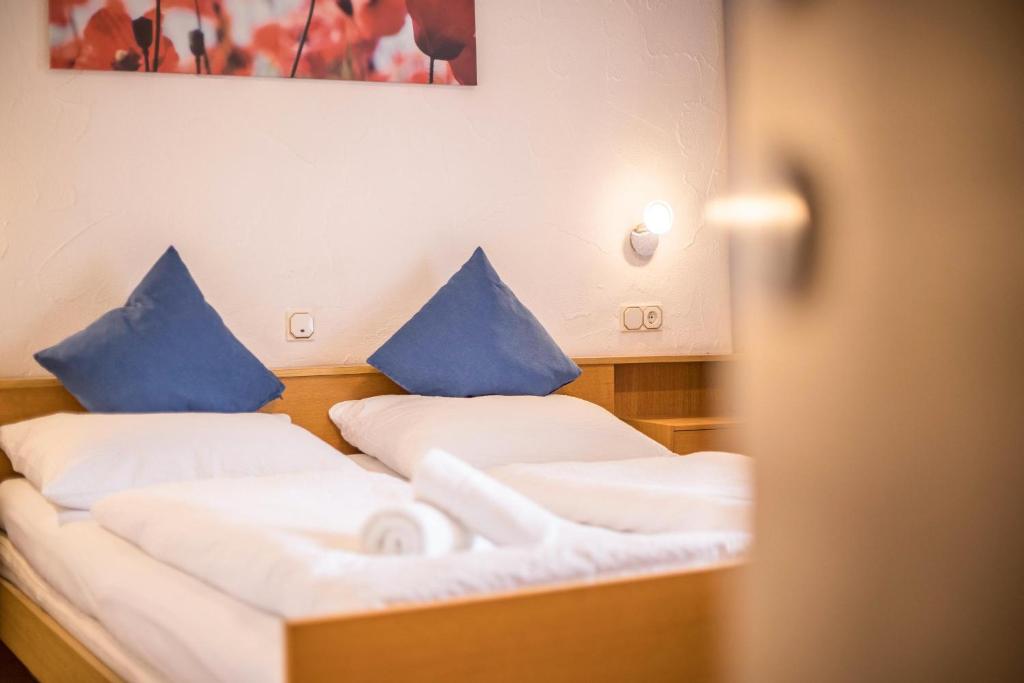 Łóżko lub łóżka w pokoju w obiekcie Apt Hofer Monika