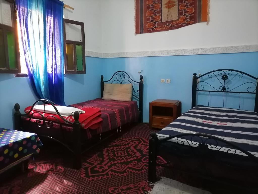 Postel nebo postele na pokoji v ubytování Gîte Tamsoulte