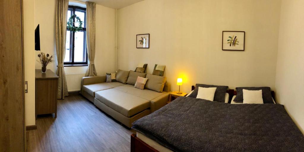 Łóżko lub łóżka w pokoju w obiekcie Yellow Ski Apartments