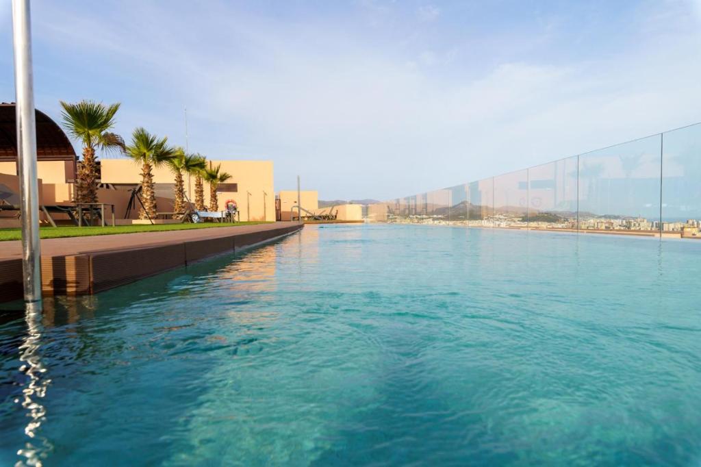 The swimming pool at or close to Teatinos Sky Garden I