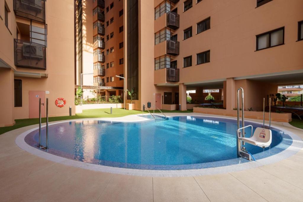 The swimming pool at or close to Teatinos Sky Garden I