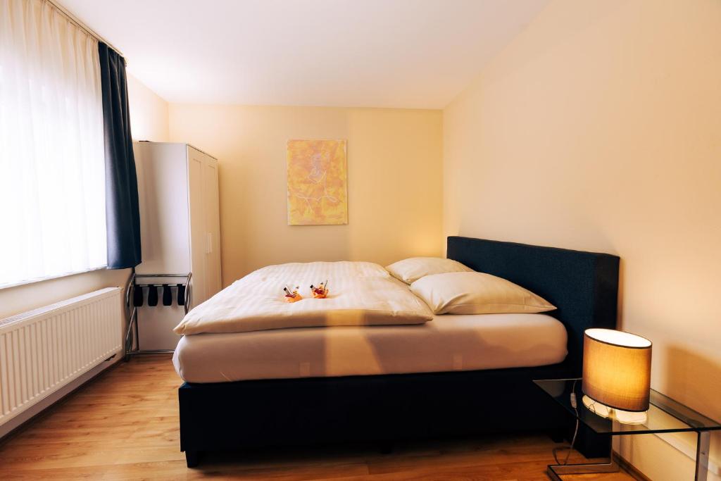 Postel nebo postele na pokoji v ubytování Hotel Restaurant Zagreb