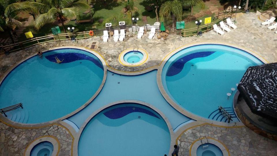 View ng pool sa Thermas Paradise Residence flats o sa malapit