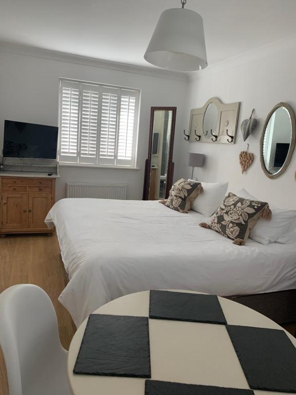 Postel nebo postele na pokoji v ubytování Harford en-suite Rooms