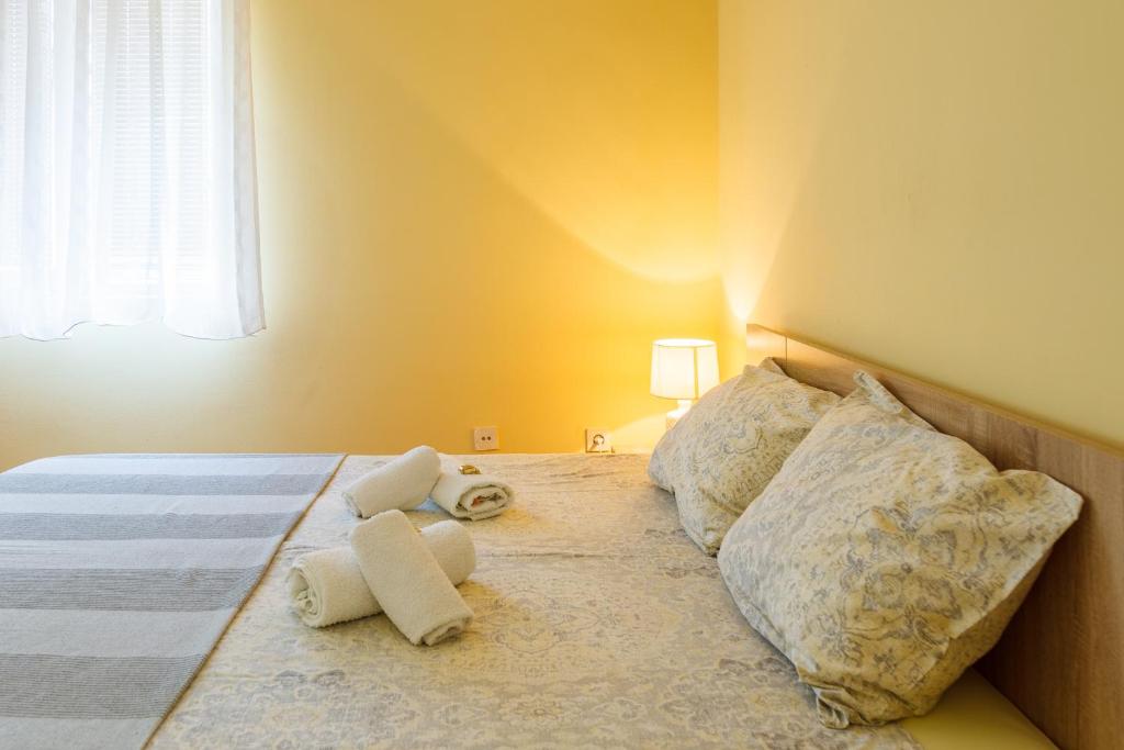 Voodi või voodid majutusasutuse Apartman Bogojevic toas