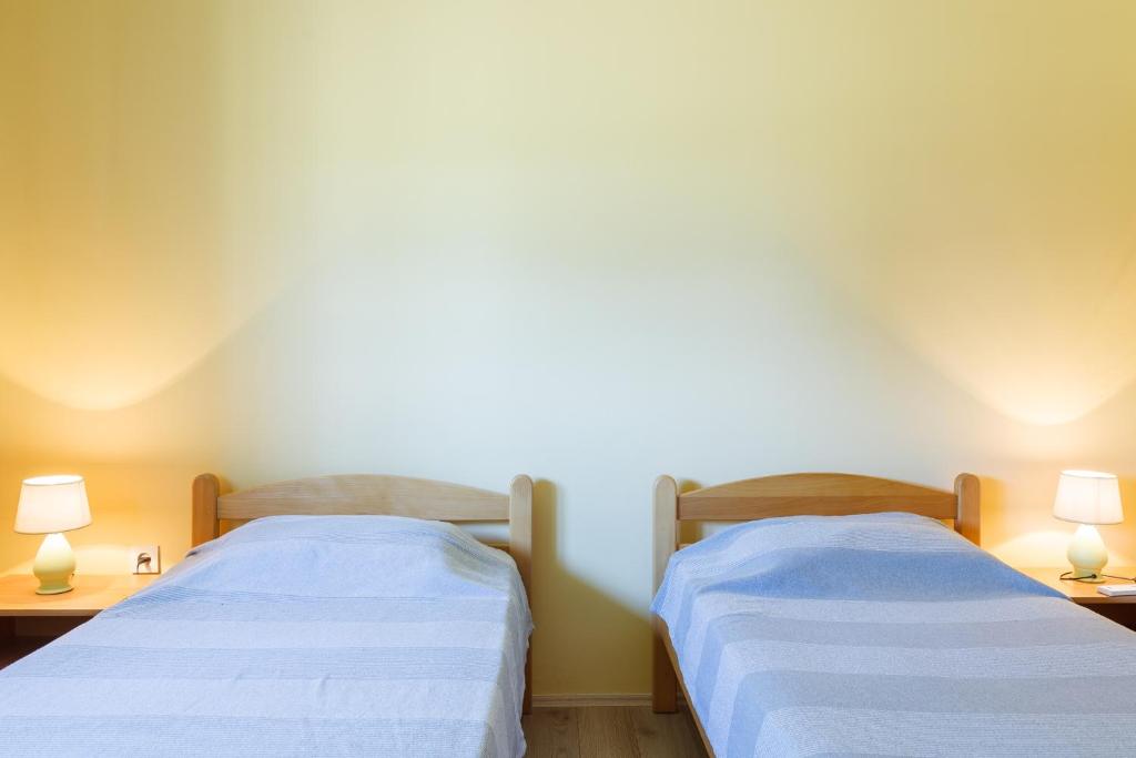 Voodi või voodid majutusasutuse Apartman Bogojevic toas