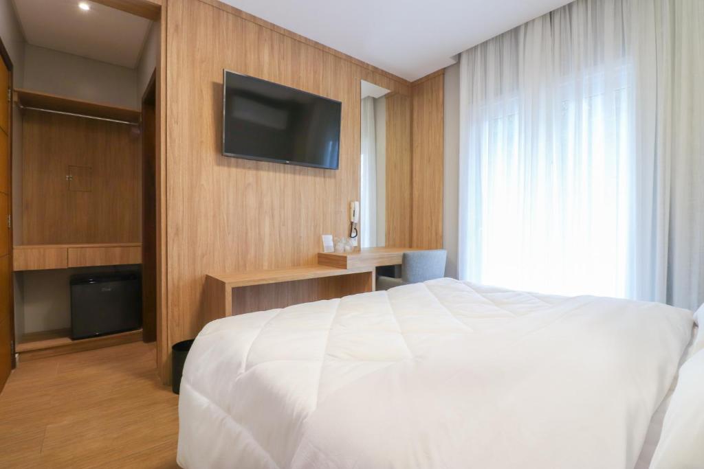 Postel nebo postele na pokoji v ubytování Pousada Bella Viena