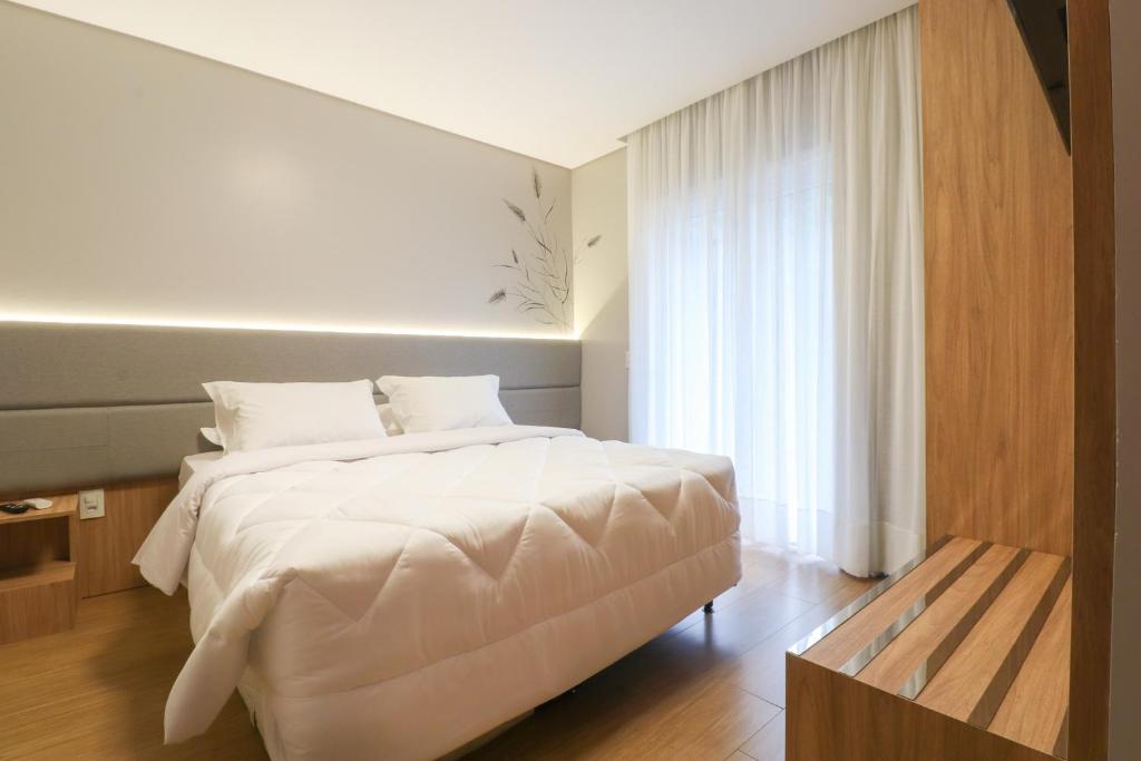 Postel nebo postele na pokoji v ubytování Pousada Bella Viena