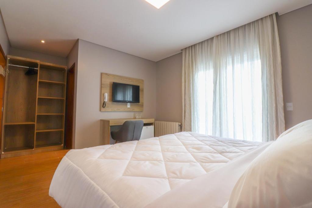 Postel nebo postele na pokoji v ubytování Pousada Bella Viena