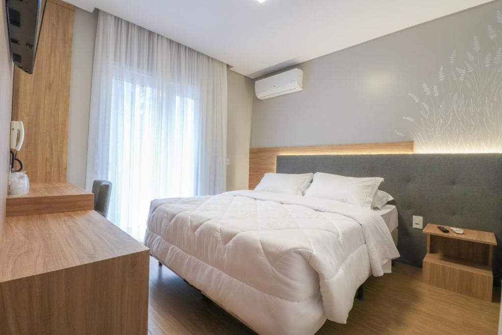 Postel nebo postele na pokoji v ubytování Pousada Bella Viena