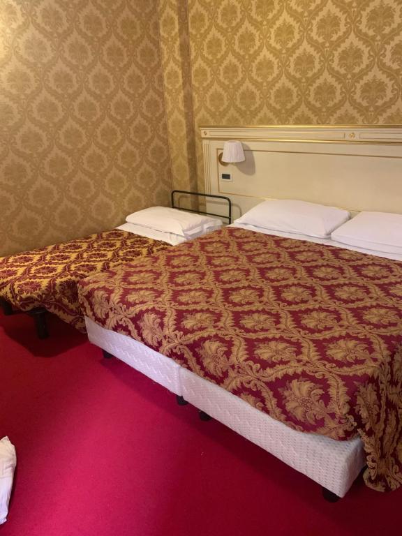 Postel nebo postele na pokoji v ubytování CASA MARGOT