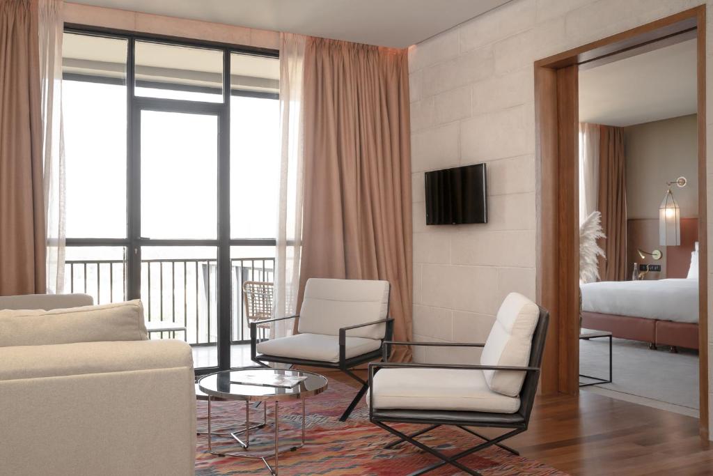 TV a/nebo společenská místnost v ubytování Hotel Sahrai