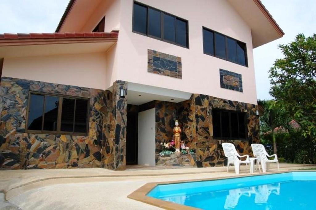 The swimming pool at or close to Tan ROCK RESORT