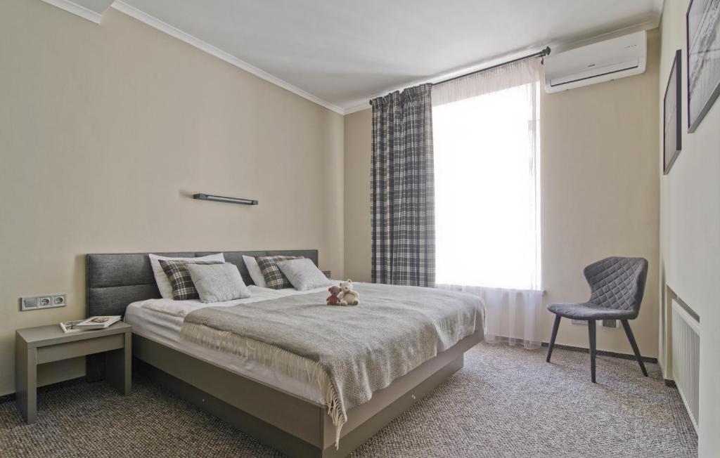 Postel nebo postele na pokoji v ubytování Deribas Hotel