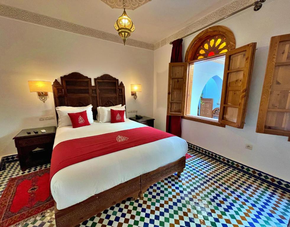 Postel nebo postele na pokoji v ubytování Riad Marjana suites & Spa
