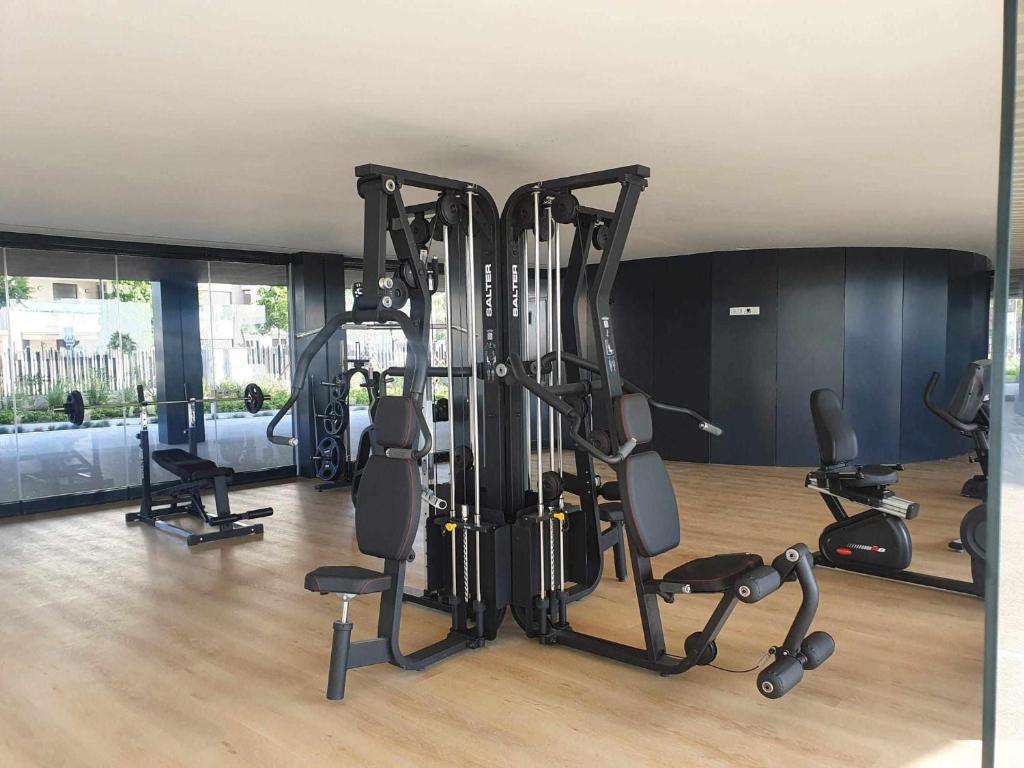Posilňovňa alebo fitness centrum v ubytovaní Espectacular bajo con jardín en 1ª línea de playa