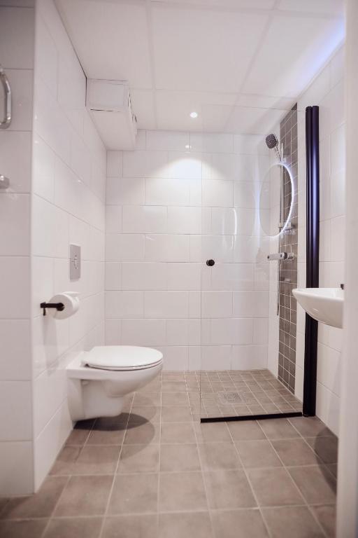 Koupelna v ubytování Siljansnäs Hotell