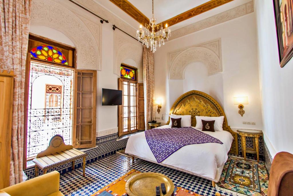 Postel nebo postele na pokoji v ubytování Riad Marjana suites & Spa