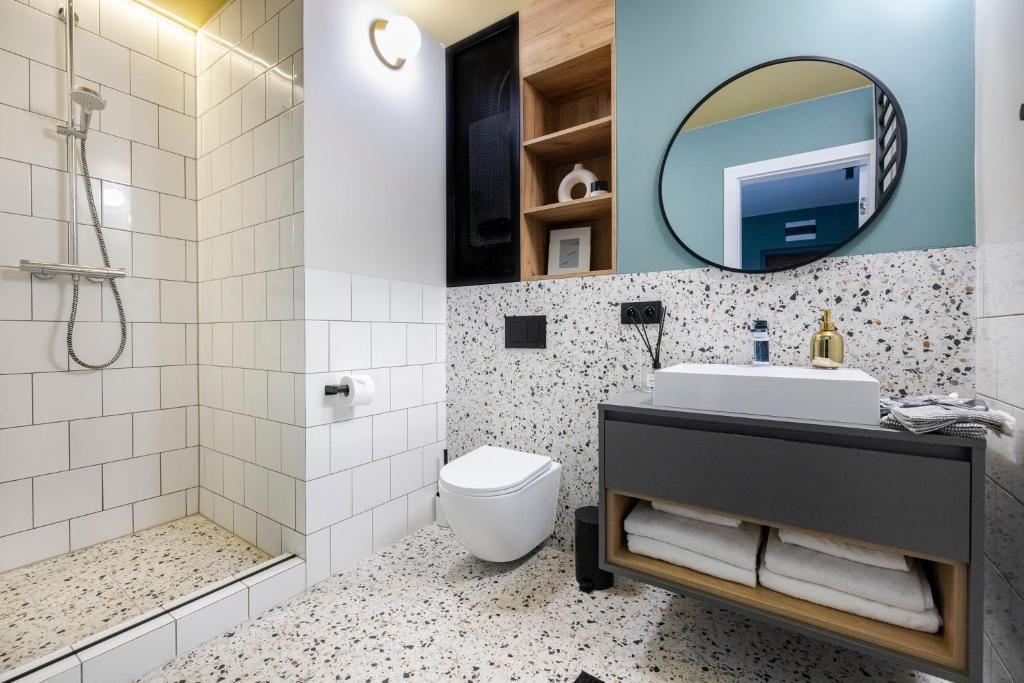 Kúpeľňa v ubytovaní Praia Apartments - 200 m do Plaży Apartament z balkonem i widokiem