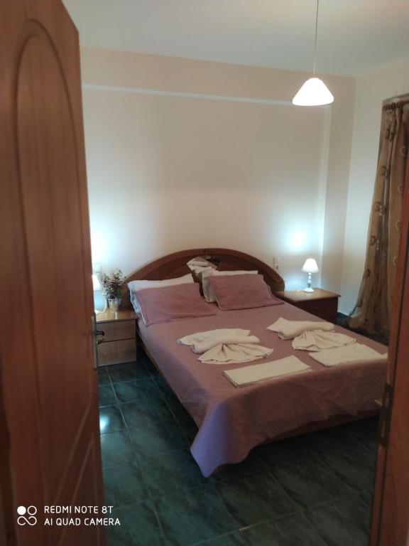 Posteľ alebo postele v izbe v ubytovaní Odisseas Apartment