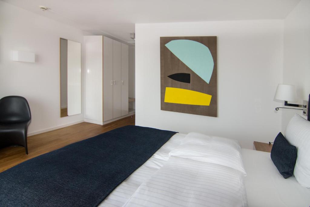 Postel nebo postele na pokoji v ubytování Downtown Vi Vadi Hotel