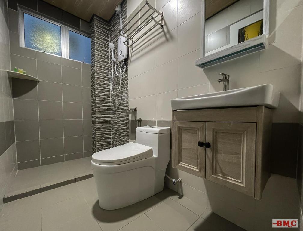 Koupelna v ubytování BMC Hotel