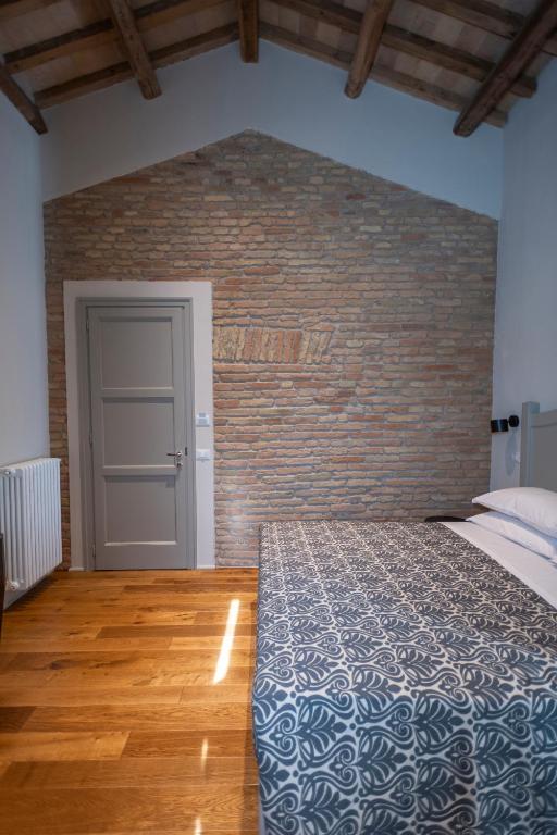 Postel nebo postele na pokoji v ubytování Sei Sequoie Nature & Charme