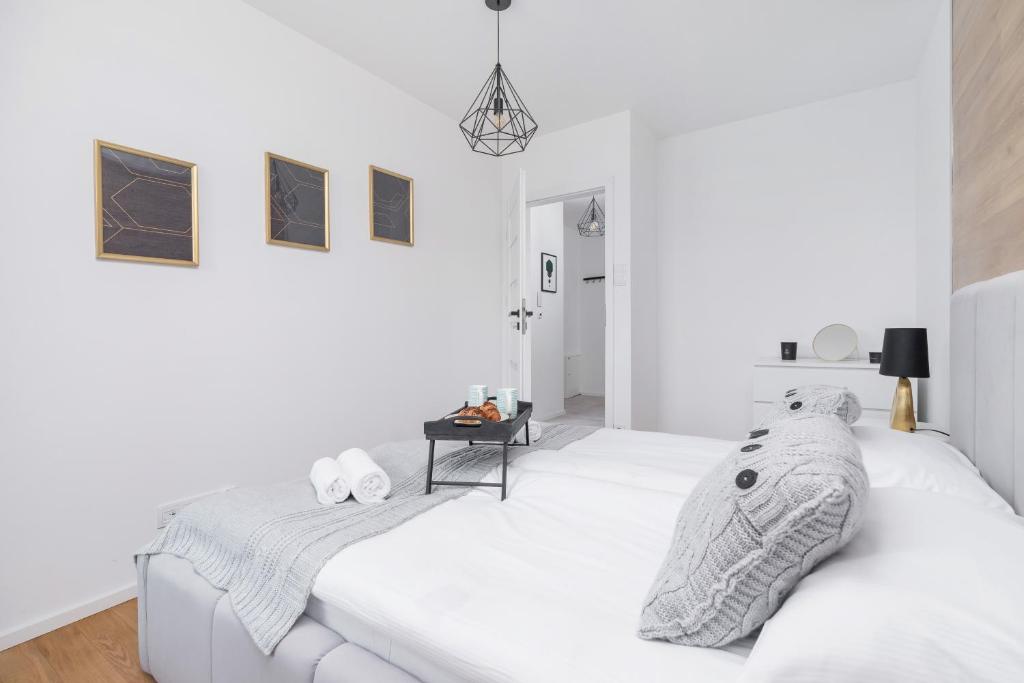 Postel nebo postele na pokoji v ubytování Riva Verona Apartments by Renters Prestige