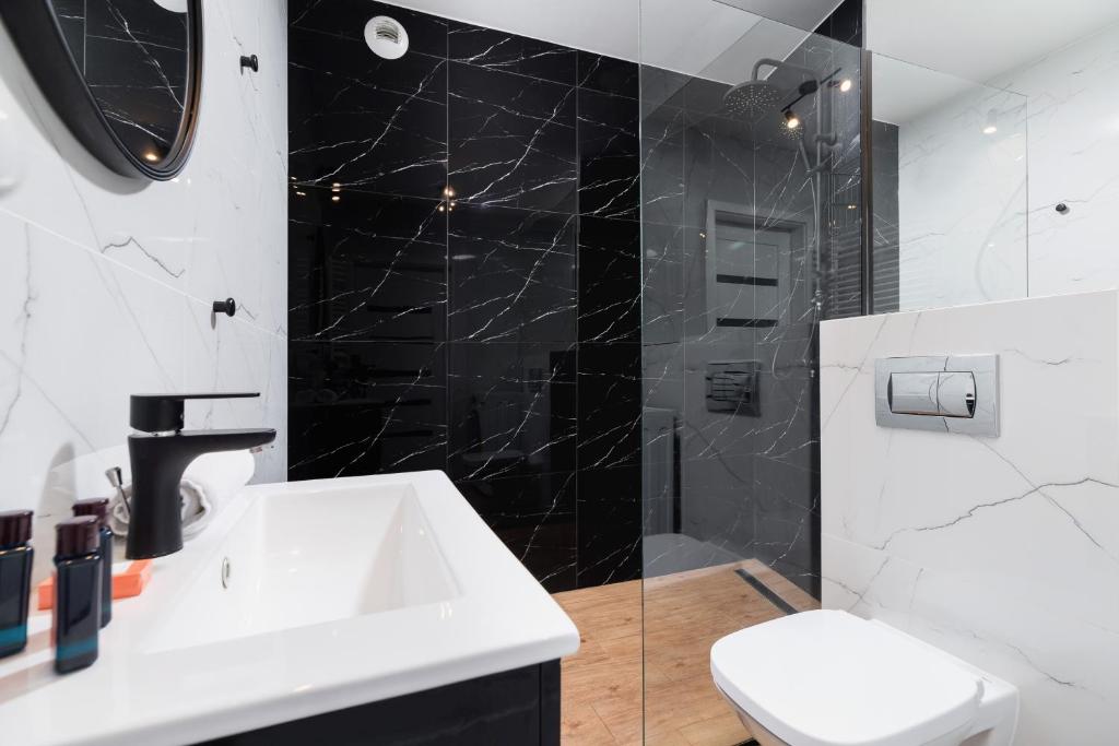 Koupelna v ubytování Riva Verona Apartments by Renters Prestige