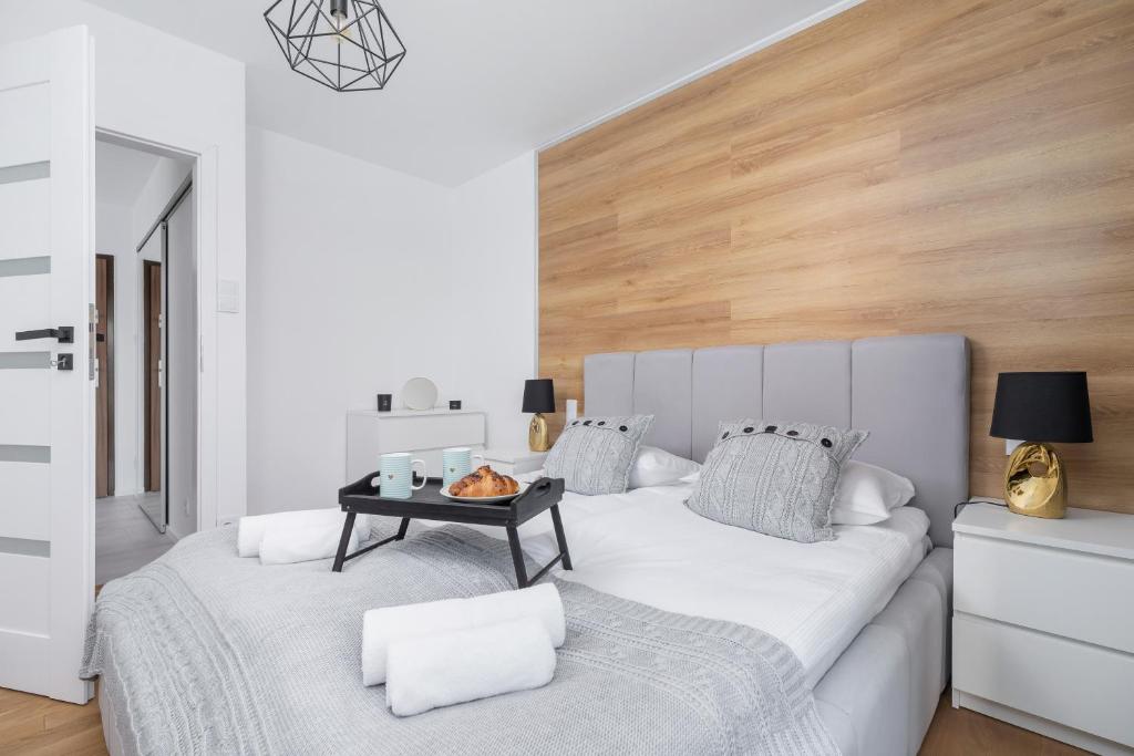 Postel nebo postele na pokoji v ubytování Riva Verona Apartments by Renters Prestige