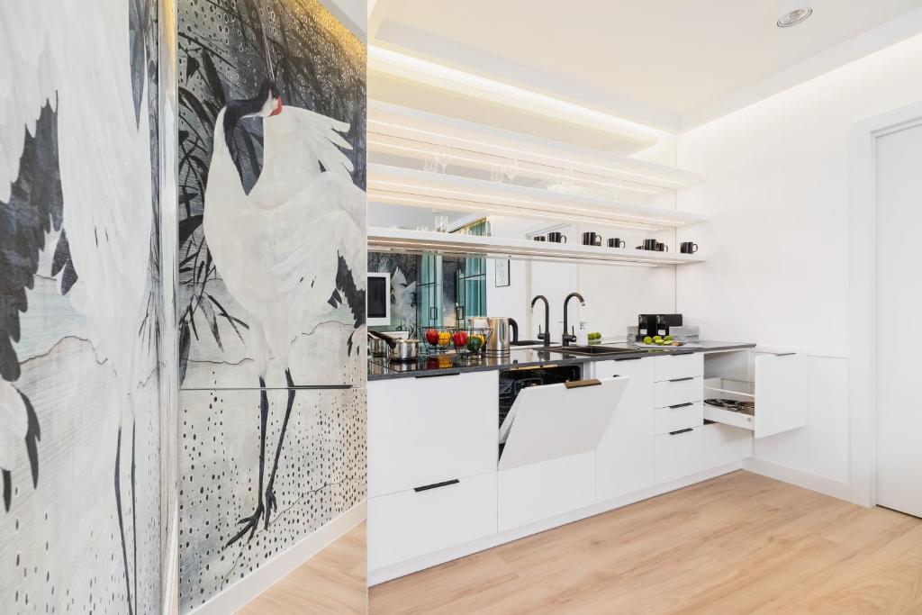 Kuchyň nebo kuchyňský kout v ubytování Riva Verona Apartments by Renters Prestige