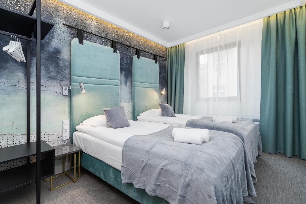 Postel nebo postele na pokoji v ubytování Riva Verona Apartments by Renters Prestige