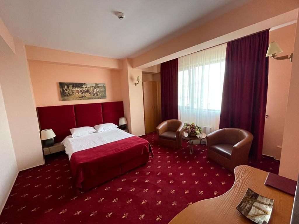 Postel nebo postele na pokoji v ubytování Hotel Class