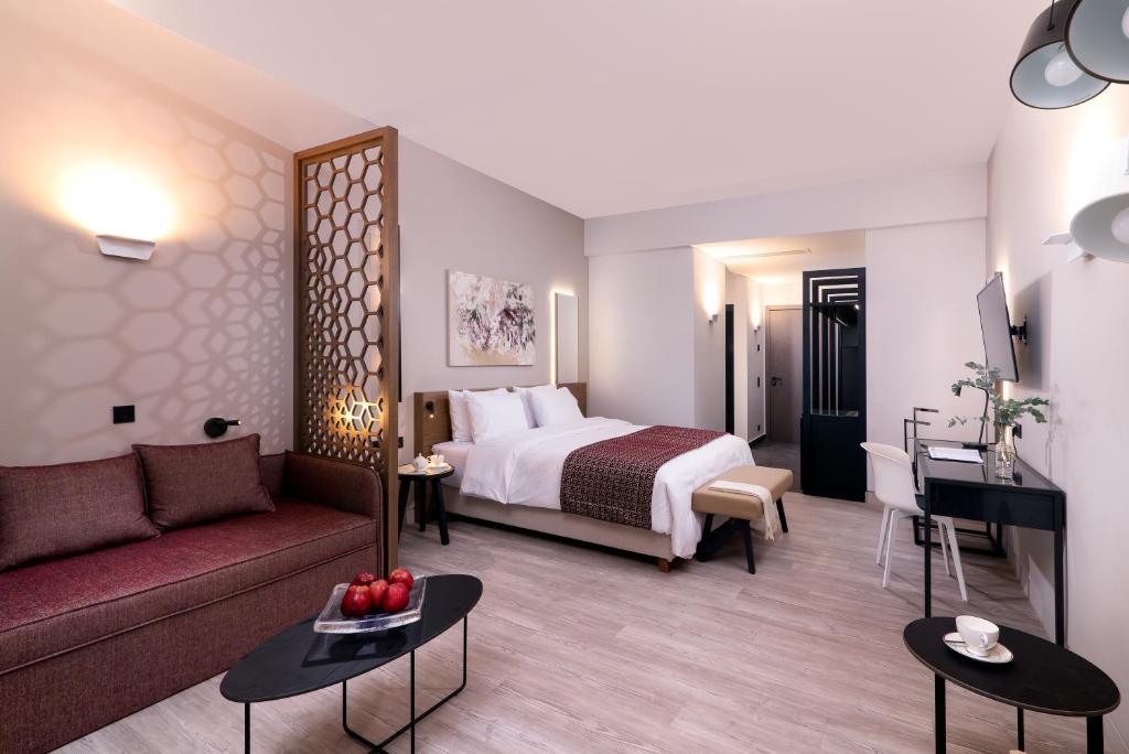 Postel nebo postele na pokoji v ubytování S Hotel Boutique Thessaloniki
